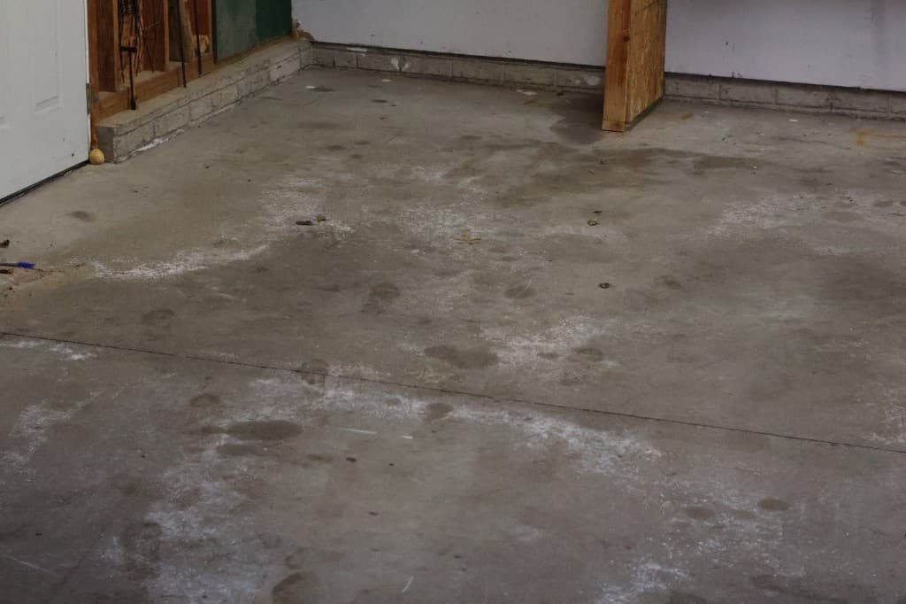 Before coating: wide view of rough garage slab.